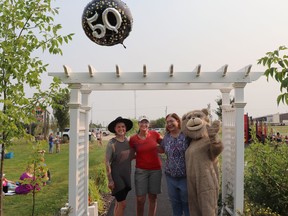 Guest instructor Bre Haun, Library Manager Gloria Wilson, board chairperson Lana McDonald and Teddy Bear marked Mayerthorpe Public Library’s 50th anniversary.