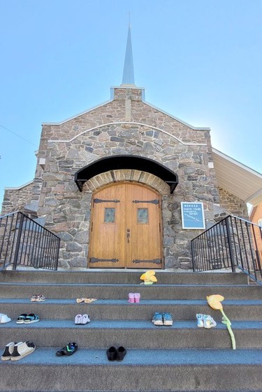 To remember Indigenous children who died at Canadian residential schools and to honour survivors and their families, people placed kids' shoes and stuffies on the steps of St. Jean Baptiste Roman Catholic Church in Pembroke on Sept. 30, the National Day For Truth and Reconciliation. Anthony Dixon
