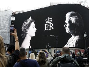 A tribute on the large screen for the late Queen Elizabeth II at Piccadilly Circus on September 09, 2022 in London, England. Elizabeth Alexandra Mary Windsor was born in Bruton Street, Mayfair, London on 21 April 1926. She married Prince Philip in 1947 and acceded the throne of the United Kingdom and Commonwealth on 6 February 1952 after the death of her Father, King George VI. Queen Elizabeth II died at Balmoral Castle in Scotland on September 8, 2022, and is succeeded by her eldest son, King Charles III.