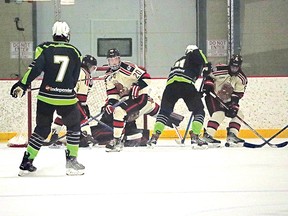 Atley Gringorten fights for the puck in front of the Beavers net. He would go on to score three goals for the Paper Kings who ended up winning 6-2 over the Beavers. 
Photo supplied