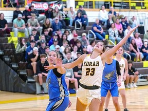 ON THE BALL IN GIRLS HOOPS Lily Fasulo of the Korah Colts and Hailey Dingwall of the Superior Heights Steelhawks look for possession on a rebound in recent senior girls high school basketball action. Korah upended Superior Heights by a 58-34 margin. BOB DAVIES