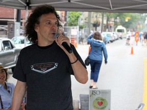 Anthony Wing, the International Symphony Orchestra's executive director, thanks the crowd for their support during the Weekend Walkabout event Sunday in downtown Sarnia.  Terry Bridge/Sarnia Observer/Postmedia Network