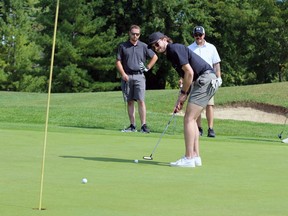 Sarnia Sting goalie Ben Gaudreau hits a putt during the team's fundraising golf tournament for Pathways Health Centre for Children on Saturday at Huron Oaks Golf Course in Bright's Grove. Terry Bridge/Sarnia Observer/Postmedia Network