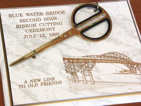 Scissors from the bridge span's opening in 1997 were among the mementos on display at the bridge corporation building Tuesday.  (Tyler Kula/ The Observer)
