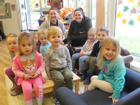Early childhood educators Paige Gilliard, left, and Jaylyn Wilton are shown with pre-school children at the North Lambton Childcare Centre in Forest.