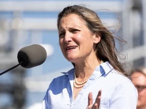 Deputy Prime Minister Chrystia Freeland (at podium) speaks after touring a hydrogen production facility operated by Air Products, an industrial gases company, before a media conference in Sherwood Park on Thursday, Aug. 25, 2022. PHOTO BY IAN KUCERAK / POSTMEDIA.