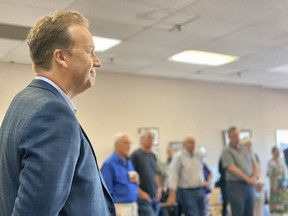 Greater Sudbury mayoral candidate Paul Lefebvre listens as he is introduced at the official opening of his campaign office at 450 Notre Dame Ave.