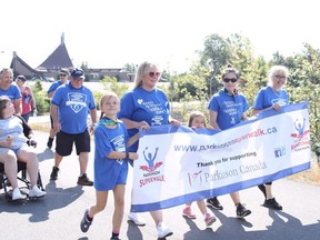More than $20,000 was raised at this year's Parkinson SuperWalk. The fundraiser returned to an in-person event at Delki Dozzi Park in 2022 following two years of virtual events.  The annual walk attracts people living with Parkinson's disease, families of the affected, caregivers, and supporters in an effort to fund research. Donations will still be accepted throughout the month of October to help find a cure and support programs for those challenged with the disease. Tim Thomson/The Sudbury Star/Postmedia Network