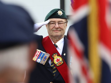 Sergeant-at-Arms Rick Smith salutes during a memorial service for Her Majesty Queen Elizabeth II at Lockerby Legion Branch 564 in Sudbury, Ont. on Monday September 19, 2022. John Lappa/Sudbury Star/Postmedia Network