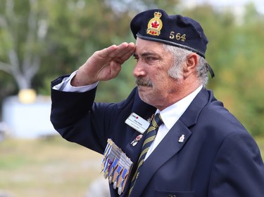 Ceremony chair Chris Peters salutes during a memorial service for Her Majesty Queen Elizabeth II at Lockerby Legion Branch 564 in Sudbury, Ont. on Monday September 19, 2022. John Lappa/Sudbury Star/Postmedia Network