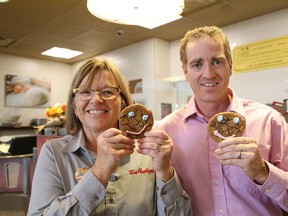 Marian MacKenzie and Troy MacKenzie, of Tim Hortons on Lasalle Boulevard in Sudbury, Ont., are encouraging Greater Sudburians to support the Smile Cookie campaign which runs until September 26, 2022. Smile Cookies can be purchased for a $1 with all proceeds supporting local charities. The charities include the Sudbury Food Bank, Health Sciences North and the CTV Lion's Children's Christmas Telethon. John Lappa/Sudbury Star/Postmedia Network