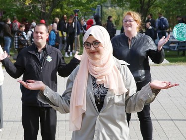 Climate activist Salma Mohamed takes part in a dance at a Fridays For Future Greater Sudbury rally at Laurentian University in Sudbury, Ont. on Thursday September 22, 2022. Sudbury climate activists took part in the rally to mark the Global Day of Action. The event was hosted by Fridays For Future Greater Sudbury in collaboration with Laurentian's Student General Assembly, the Laurentian Environmental Sustainable Committee, CCL Greater Sudbury and Coalition for a Liveable Sudbury. John Lappa/Sudbury Star/Postmedia Network