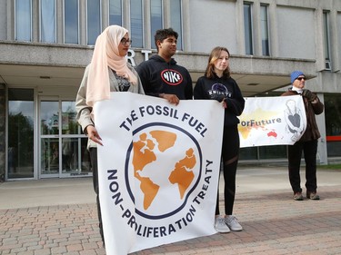 Climate activists Salma Mohamed, left, Arjun Shukla and Jane Walker participate in a Fridays For Future Greater Sudbury rally at Laurentian University in Sudbury, Ont. on Thursday September 22, 2022. Sudbury climate activists took part in the rally to mark the Global Day of Action. The event was hosted by Fridays For Future Greater Sudbury in collaboration with Laurentian's Student General Assembly, the Laurentian Environmental Sustainable Committee, CCL Greater Sudbury and Coalition for a Liveable Sudbury. John Lappa/Sudbury Star/Postmedia Network