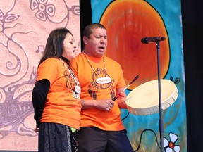 Trudy Jones and Darcy Trudeau performed during a presentation for the National Day for Truth and Reconciliation at the Grace Hartman Amphitheatre at Bell Park in Sudbury, Ont. on Friday September 30, 2022. John Lappa/Sudbury Star/Postmedia Network