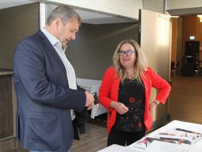 Jennifer Gorman, United Way's regional manager for Cochrane and Timiskaming, chats with Timmins Chamber president Daniel Ayotte following the United Way campaign launch held at the Timmins Ramada Inn Thursday morning.

RON GRECH/The Daily Press