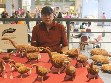 Outside the gymnasium and in the cafeteria at Northern College there were booths, vendors and Indigenous crafters displaying their wares. Among them was John Etherington, who has been producing traditional handicrafts for 45 years, was displaying his soapstone carvings and tamarack birds.

RON GRECH/The Daily Press