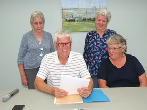 Tillsonburg and District Historical Society is getting back to normal after two years of COVID-induced restrictions. A brief meeting on Sept. 19 saw executive members returned to office, and one new director added. Shown seated are Dave Morris, president, and Marilyn Avent, new director. Standing are Betty Lou Wallington, treasurer, and Joan Weston, vice-president. Secretary Dave Bertling and directors Betty Lou Ireland and Len Ladoucer were unable to attend. At the Oct. 17 meeting Joan Weston will speak on early railroads in Tillsonburg. All meetings are open to the public. SUBMITTED