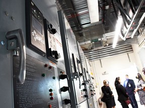 Chatham-Kent Health Alliance staff and local media tour the electrical room at the Wallaceburg hospital's new power plant on Sept. 1. Tom Morrison/Chatham This Week