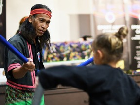 Shishir Inocalla, left, trains students from Wallaceburg Martial Arts in Arnis, a Filipino martial art, at the Wallaceburg & District Museum.  (Tom Morrison/Postmedia Network)