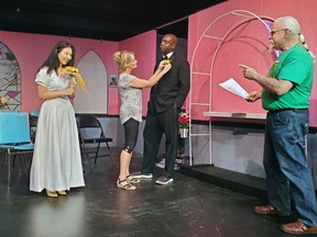 Members of the cast rehearse a scene from the Ingersoll Theatre of the Performing Arts' upcoming production of Four Weddings and an Elvis. (Submitted photo)