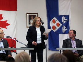 Acclaimed Deputy Mayor Shirley Keaveney makes an opening statement ahead of the Municipality of Meaford mayoral debate between candidates Ross Kentner (left) and Paul Vickers inside the Bognor Community Hall on Thursday, Sept. 29, 2022. Greg Cowan/The Sun Times