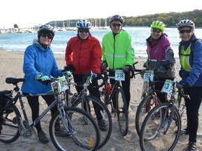 A group of friends gather on Lion's Head beach before the start of the Bruce Peninsula Lighthouse Gravel Gran Fondo on Sunday, October 2, 2022. From left are Thelma Hamilton of Tobermory and Waterloo, Jay Thibert of Port Perry, Peter Rasberryof Tobermory and Kitchener, Coosje Weber of Tobermory and Waterloo, and Bev Thibert of Port Perry. A total of 400 riders took part in the event.