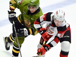 Owen Van Steensel of the North Bay Battalion competes with Thomas Sirman of the Ottawa 67's during one of the teams' clashes last season. The Troops will face the the 67's in Ottawa on Saturday to close out a three-game road trip.