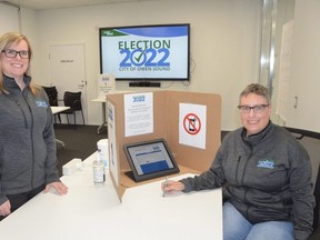 City Clerk Briana Bloomfield, left, and Manager of Legislative Services Kristen Van Alphen at one of the voting kiosks at the Election Help Centre at Owen Sound city hall on Tuesday, October 11, 2022. Online and telephone voting for the October 24 election in the City of Owen Sound begins Friday at 10 a.m.