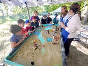 Students from Rosedale Public School in Sarnia were among the 600 in attendance for the second day of the Chatham-Kent & Lambton Children's Water Festival on Oct. 5 at the C.M. Wilson Conservation Area. They learned about erosion and flooiding at the Muddy Waters station. Ellwood Shreve/Postmedia