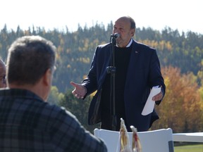 Michael Tibollo, Ontario's Minister of Mental Health and Addictions, speaking on Oct. 11 at the Kenora Chiefs Advisory Youth and Family Wellness Camp, with Makwa Patrol manager Marshall Hardy and MPP Greg Rickford being some of the many who were in attendance. 
Photo by Bronson Carver
