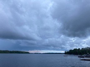 Ominous clouds form over a lake north of Sudbury. The area is expected to get hit with strong winds on Wednesday, gusting as high as 90 km/hr.