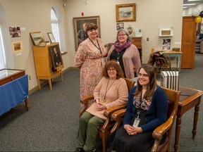 The Stratford-Perth Archives is celebrating its 50th anniversary with a special exhibit showcasing some of its employees favourite treasuers. Pictured in the back is Cindy Sinko (left) and Betty Jo Belton. Pictured in the front is Ellen Thomas (left) and Jenn Georgiou. Chris MontaniniStratford Beacon Herald