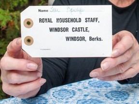 Former royal nanny Jean Alice Rowcliffe holds luggage tags she kept as a memento of her time working at Buckingham Palace. Rowcliffe, who now lives in St. Marys, will share her experiences at a fundraiser for the city's skate park later this month. (Chris Montanini/Stratford Beacon Herald)
