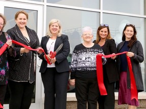 CAA opened a new location at the RioCan Centre, 100 Donna Dr., Unit D11 in Sudbury, Ontario on Thursday, October 13, 2022. Pictured from left are Debbie Gilbert, store manager; Patricia Marques, director of sales for CAA North and East Ontario; Marianne Matichuk, board member for CAA North and East Ontario; Marlene Moir, CAA member; Lia Kupchanko, regional manager of retail and travel sales for CAA North and East Ontario; and Jennifer Self, director of business development and engagement for the Greater Sudbury Chamber of Commerce, during a ribbon-cutting ceremony during the grand opening. Ben Leeson/The Sudbury Star/Postmedia Network