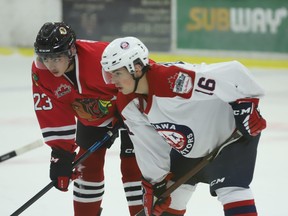 Forwards Zach Biniaris (left) of Brockville and Antoine Gauthier of Ottawa await a faceoff during the opener of the Braves-Jr. Senators home-and-home on Friday, Oct. 14, 2022. Brockville won 2-1 in overtime; Ottawa won the closer 5-2 on Saturday.
Tim Ruhnke/The Recorder and Times