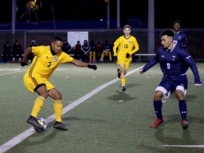 Amari MacGlashan (2) of the Laurentian Voyageurs handles the ball while under pressure from Stefano Capano (9) of the Toronto Varsity Blues during OUA men's soccer action at James Jerome Sports Complex in Sudbury, Ontario on Saturday, October 15, 2022.