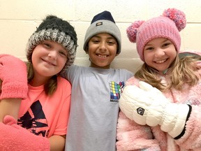 Carl A. Nesbitt Public School students, from left, Julianne Landry, Ezra Gomez and Jayden Hintsa get a head start on the Winter Clothing Drive. Community members can drop off cleaned and bagged winter items at any of Greater Sudbury’s four Canadian Tire locations on Oct. 22 from 10 a.m. to 3 p.m. An additional collection day will take place at Carl A. Nesbitt Public School on Oct. 21.