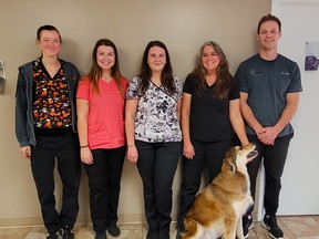 Five of the nine people who work at the West Lorne Animal Hospital, along with mascot and companion River, are: Heidi Flaven, Hailey Lunn, Abby Lewinsky, Denise Jack, and Dr. Jacob Keitel. Larry Schneider photo