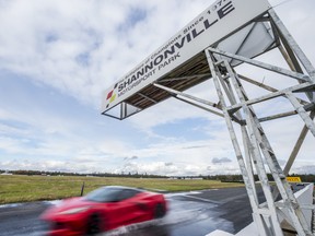 A corvette speeds past the Shannonville Motorsport Park finish line as drivers tear through the park's the Nelson track on Wednesday in Shannonville, Ontario. ALEX FILIPE