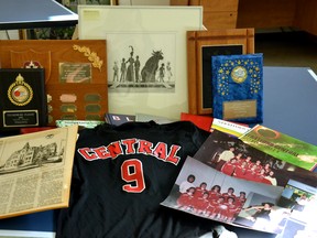 Piles of historical school memorabilia from the former Stratford Central and Stratford Northwestern secondary schools will be up for grabs in exchange a donation of the buyer's choice during an open house at Stratford District Secondary School Oct. 27. Pictured is a very small selection of the Stratford Central Secondary School memorabilia ranging from yearbooks and awards to jerseys, photos and student artwork that will be available for purchase. Galen Simmons/The Beacon Herald/Postmedia Network