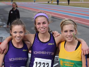 Kyla Pettigrew, left, and Alannah MacLean of Lo-Ellen Park and Katie Wismer of Lockerby during their high school cross-country days in 2010.