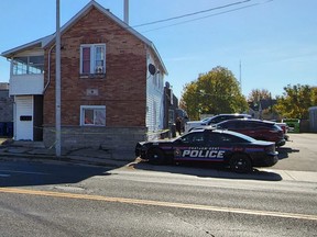 Chatham-Kent police remained at the scene on Richmond Street near Queen Street on Saturday after a Friday night incident that left a male youth dead. Another male youth was charged with second-degree murder. Police called it an isolated incident, adding there is no concern for public safety. (Trevor Terfloth/The Daily News)