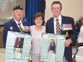 Royal Canadian Legion Branch 6 Ladies Auxiliary President Irene Surridge with her sons, Master Warrant Officer Kenneth Surridge, left, and Chief Warrant Officer Lawrence Surridge. Both were recognized at the Billy Bishop Museum's 22nd Annual Honouring Our Local Veterans ceremony at the Royal Canadian Legion Branch 6 in Owen Sound, Ontario, on Sunday, October 23, 2023.