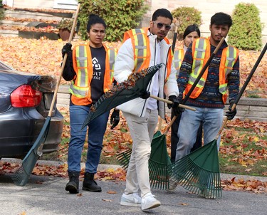 Sault College students on Malabar Drive during Trades Day of Caring on Saturday, Oct. 22, 2022 in Sault Ste. Marie, Ont. (BRIAN KELLY/THE SAULT STAR/POSTMEDIA NETWORK)