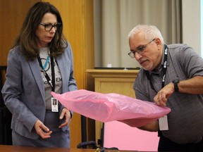 City clerk Rachel Tyczinski and IT manager Frank Coccimiglio package an electronic tabulator after collecting ballot data. JEFFREY OUGLER/THE SAULT STAR