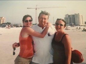 John Rhodes’ daughters Jennifer (left) and Lauren (right) with Uncle Jimmy at Clearwater Beach, 2009.