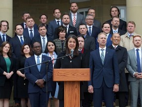 Premier Danielle Smith, front, speaks after her cabinet was sworn in at Government House in Edmonton on Monday, Oct. 24, 2022. PHOTO BY DAVID BLOOM /Postmedia