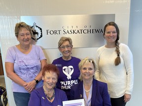 Fort Saskatchewan city council and members of the Fort Saskatchewan Royal Purple joined to recognize brain injury awareness and its symptoms. Photo Supplied.