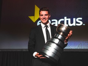 Jamieson Fregeau of Kenora holding the Enactus 2022 Student Entrepreneur National Champion award trophy in Toronto, ON. Photo courtesy of Enactus Canada