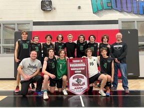 The Horizon Aigles senior boys volleyball team poses with the banner from the recent Esc Champlain tournament.